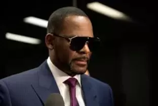 R. Kelly Seeks Pardon from Trump, Citing Corruption and Fears for His Life in Prison
